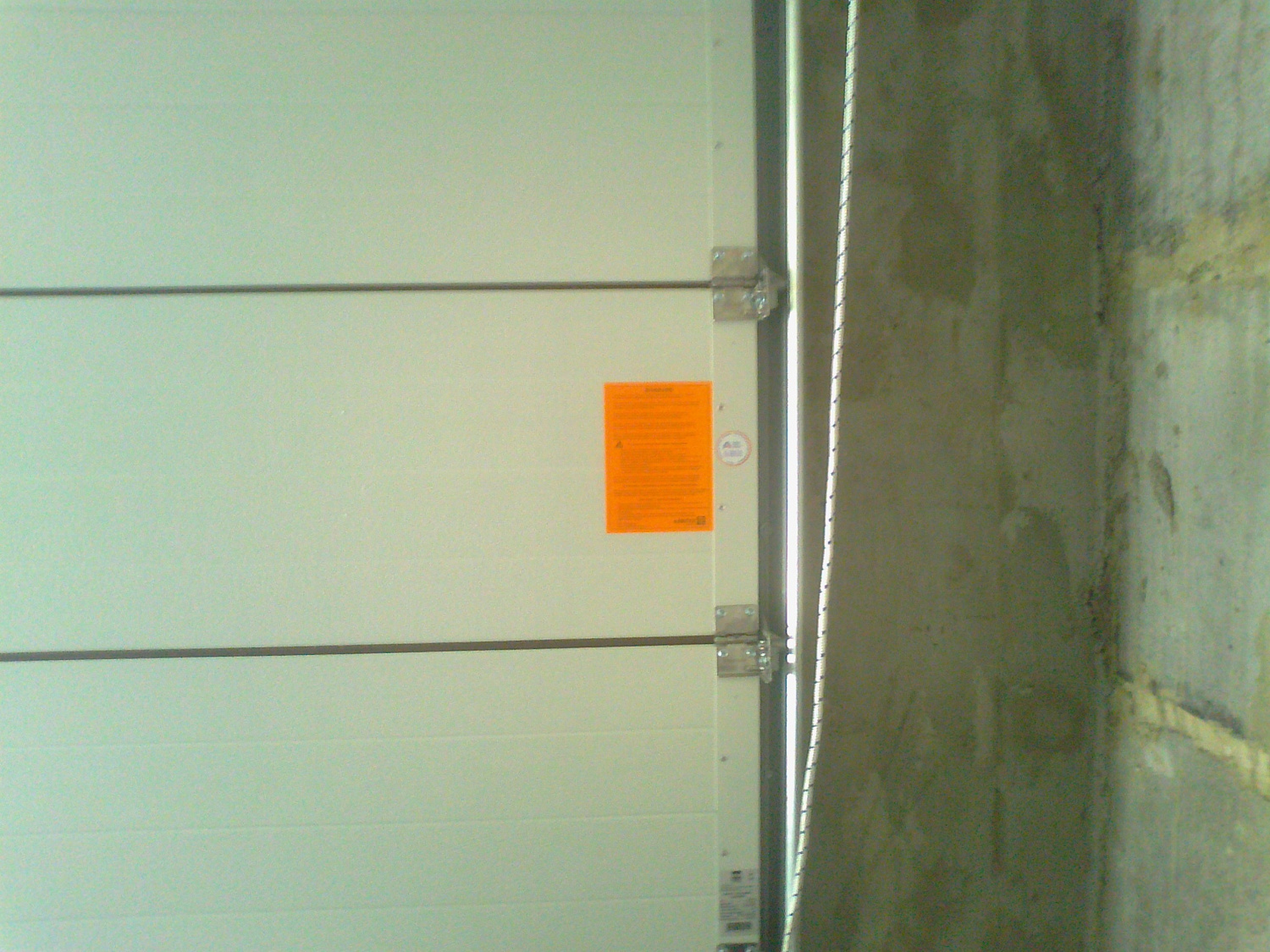 Гаражные автоматические секционные ворота Алютех.