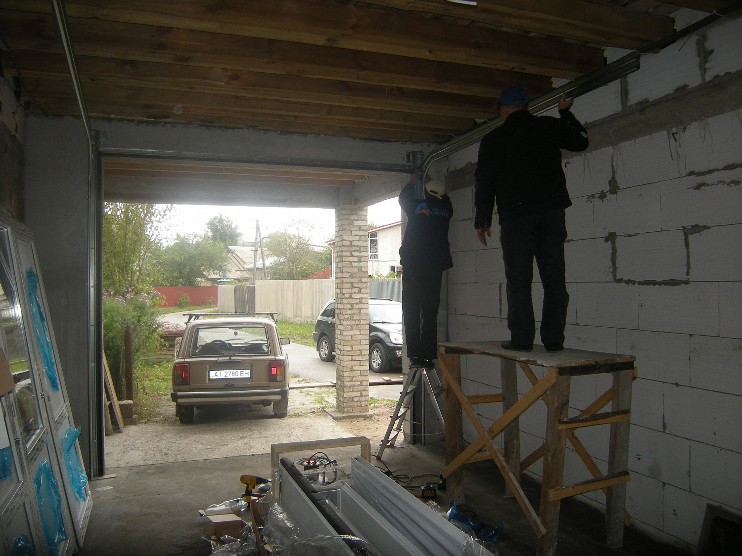 Ворота секционные автоматические с торсионным пружинами.